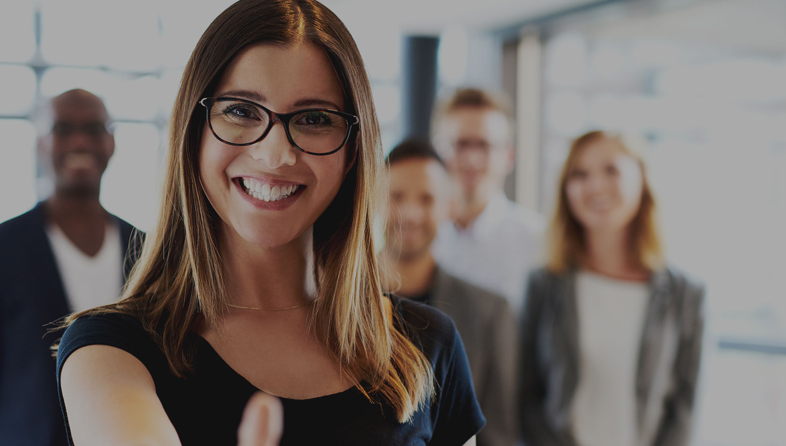 Investment professional welcoming a client